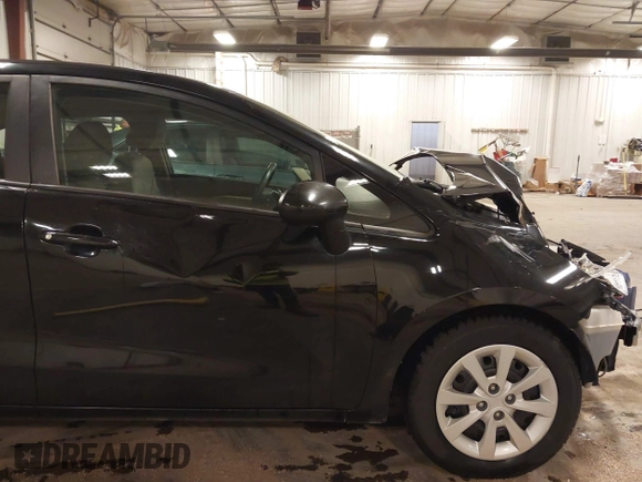 2014 Kia Rio LX with VIN KNADM4A32E6409785, listed as a IAAI auction lot 41810262 with 183,669 mi miles. Bid and sale history available at carsss.com. Image 19.