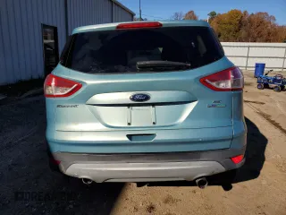 2013 Ford Escape SE with VIN 1FMCU0GXXDUB36747, listed as a Copart auction lot 84262084 with 105,246 mi miles and Salvage Title. Bid and sale history available at carsss.com. Image 6.
