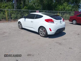 2016 Hyundai Veloster with VIN KMHTC6AD3GU270895, listed as a IAAI auction lot 42139765 with 138,884 mi miles. Bid and sale history available at carsss.com. Image 3.