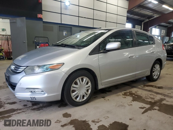 2010 Honda Insight LX z VIN JHMZE2H5XAS018546, wystawiony jako Copart lot #61411545 z przebiegiem 55 814 mil mil oraz Czysty tytuł • Clean title. Historia ofert i sprzedaży dostępna na DreamBid. Obrazek 1.