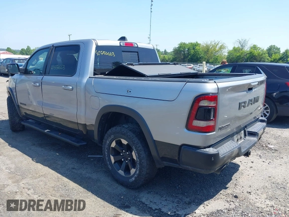 2019 Ram 1500 Rebel with VIN 1C6SRFLT8KN797618, listed as a IAAI auction lot 42556663 with 92,606 mi miles and . Bid and sale history available at DreamBid. Image 3.