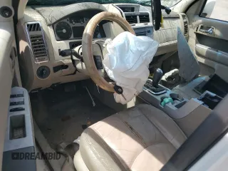 2010 Mercury Mariner Premier with VIN 4M2CN8H70AKJ17236, listed as a Copart auction lot 54974705 with Not provided miles and Salvage title. Bid and sale history available at DreamBid. Image 8.