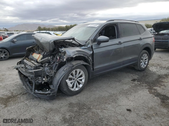 2018 Volkswagen Tiguan S with VIN 3VV1B7AX5JM097909, listed as a Copart auction lot 82410404 with 107,349 mi miles and Salvage Title. Bid and sale history available at carsss.com. Image 1.