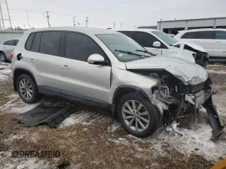 2011 Volkswagen Tiguan SEL with VIN WVGBV7AX3BW562761, listed as a Copart auction lot 85906534 with 84,635 mi miles and Salvage Title. Bid and sale history available at DreamBid. Image 4.