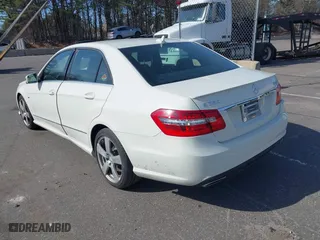 2012 Mercedes-Benz E-Class E 350 Luxury with VIN WDDHF8JB2CA619686, listed as a IAAI auction lot 42079521 with 129,025 mi miles. Bid and sale history available at carsss.com. Image 3.