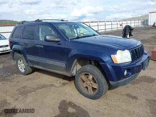 2005 Jeep Grand Cherokee Laredo with VIN 1J8GR48K45C534005, listed as a IAAI auction lot 41759692 with 211,566 mi miles. Bid and sale history available at carsss.com. Image 1.