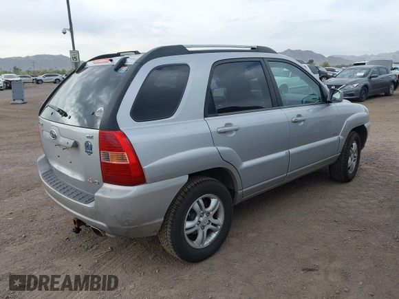2005 Kia Sportage LX with VIN KNDJE723557070596, listed as a IAAI auction lot 42008414 with 215,204 mi miles and . Bid and sale history available at carsss.com. Image 4.