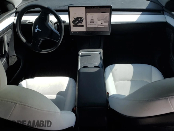 2023 Tesla Model Y Long Range z VIN 7SAYGAEE9PF662103, wystawiony jako Copart lot #51332105 z przebiegiem 35 294 mil mil oraz Szkoda całkowita • Salvage title. Historia ofert i sprzedaży dostępna na DreamBid. Obrazek 8.