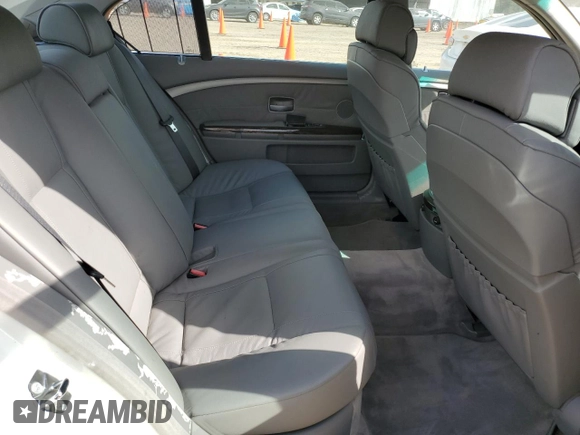 2004 BMW 7 Series 745Li z VIN WBAGN635C4DS52148, wystawiony jako Copart lot #44372875 z przebiegiem Nie podano mil oraz Czysty tytuł • Clean title. Historia ofert i sprzedaży dostępna na DreamBid. Obrazek 10.
