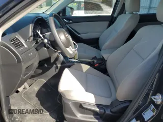 2015 Mazda CX-5 Sport with VIN JM3KE2BEXF0483141, listed as a Copart auction lot 59134105 with 71,727 mi miles and Salvage title. Bid and sale history available at DreamBid. Image 7.