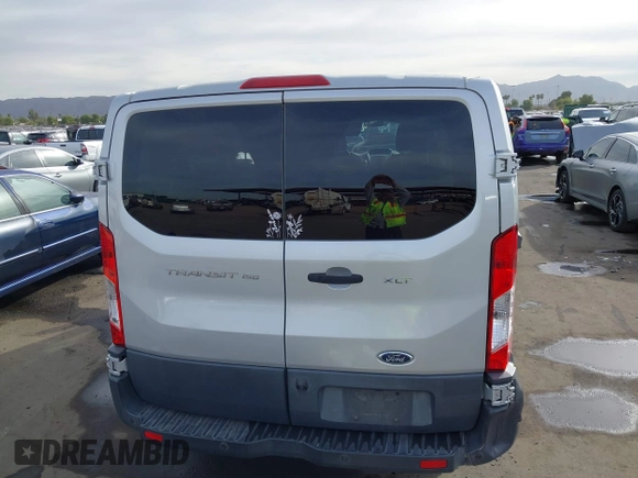 2015 Ford Transit XL z VIN 1FMZK1YMXFKA97523, wystawiony jako IAAI lot #40971108 z przebiegiem 253 712 mil mil oraz . Historia ofert i sprzedaży dostępna na DreamBid. Obrazek 16.