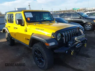 2021 Jeep Wrangler Unlimited Sport S with VIN 1C4HJXDN6MW597477, listed as a IAAI auction lot 41089112 with 82,315 mi miles. Bid and sale history available at carsss.com. Image 1.