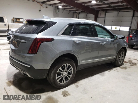 2023 Cadillac XT5 AWD Premium Luxury with VIN 1GYKNDRS5PZ221261, listed as a Copart auction lot 52779565 with 7,098 mi miles and Salvage Title. Bid and sale history available at DreamBid. Image 3.