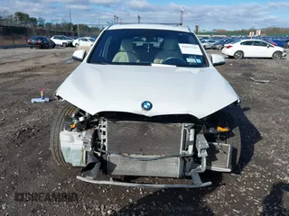 2018 BMW X1 xDrive28i with VIN WBXHT3C34J5L29714, listed as a IAAI auction lot 41825126 with 89,970 mi miles. Bid and sale history available at carsss.com. Image 12.