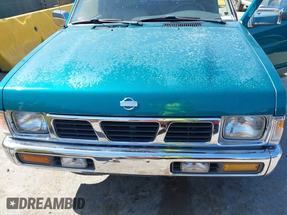 1995 Nissan Frontier XE z VIN 1N6SD16S2SC385250, wystawiony jako IAAI lot #42373497 z przebiegiem 252 537 mil mil oraz . Historia ofert i sprzedaży dostępna na DreamBid. Obrazek 6.