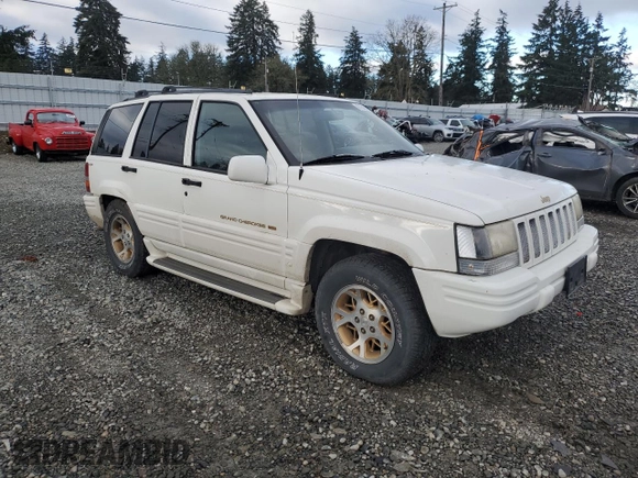 1997 Jeep Grand Cherokee Limited with VIN 1J4GZ78Y7VC772292, listed as a Copart auction lot 87692445 with 0 mi miles and Salvage Title. Bid and sale history available at carsss.com. Image 4.