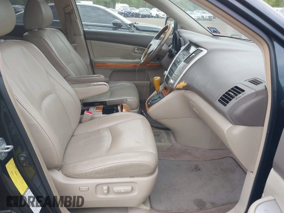 2006 Lexus RX 330 with VIN 2T2HA31U56C090677, listed as a IAAI auction lot 42182540 with 216,676 mi miles. Bid and sale history available at carsss.com. Image 5.