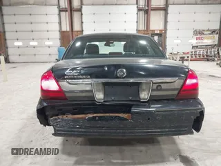 2008 Mercury Grand Marquis LS z VIN 2MEFM75V18X617284, wystawiony jako IAAI lot #41948364 z przebiegiem 106 294 mil mil oraz . Historia ofert i sprzedaży dostępna na DreamBid. Obrazek 14.