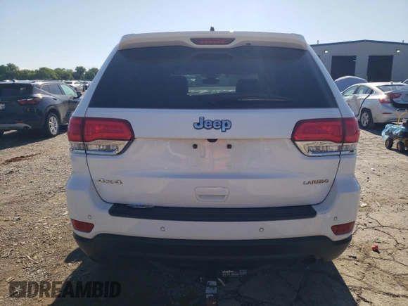 2018 Jeep Grand Cherokee Altitude with VIN 1C4RJFAG2JC258264, listed as a Copart auction lot 55262915 with 102,633 mi miles and Salvage title. Bid and sale history available at DreamBid. Image 6.