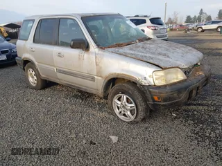 1998 Honda CR-V LX with VIN JHLRD2848WC018898, listed as a IAAI auction lot 41024605 with 246,285 mi miles. Bid and sale history available at carsss.com. Image 1.
