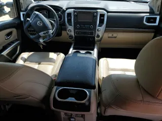2017 Nissan Titan SL z VIN 1N6BA1F49HN514463, wystawiony jako Copart lot #51046805 z przebiegiem 99 686 mil mil oraz Szkody całkowita. Historia ofert i sprzedaży dostępna na DreamBid. Obrazek 8.