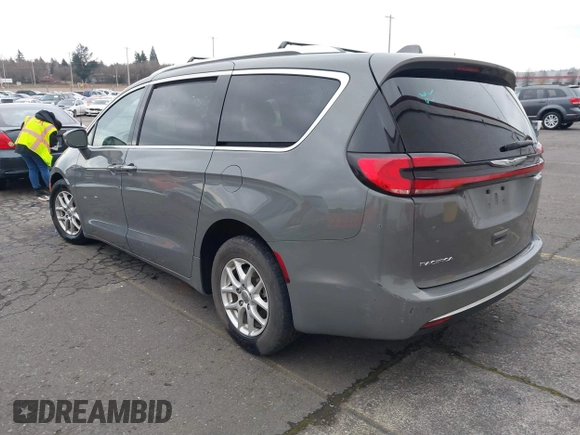 2021 Chrysler Pacifica Touring L with VIN 2C4RC1BG0MR543634, listed as a IAAI auction lot 41513467 with 148,010 mi miles and . Bid and sale history available at DreamBid. Image 3.
