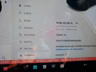 2021 Tesla Model Y Long Range z VIN 5YJYGDEE3MF092495, wystawiony jako Copart lot #50664225 z przebiegiem 72 947 mil mil oraz Szkoda całkowita • Salvage title. Historia ofert i sprzedaży dostępna na DreamBid. Obrazek 9.