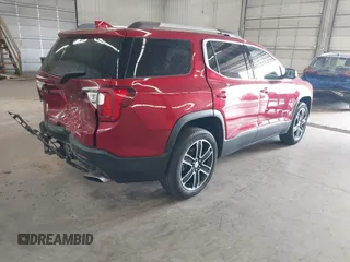 2023 GMC Acadia SLT with VIN 1GKKNULS2PZ220880, listed as a IAAI auction lot 42104702 with 33,536 mi miles and . Bid and sale history available at DreamBid. Image 4.