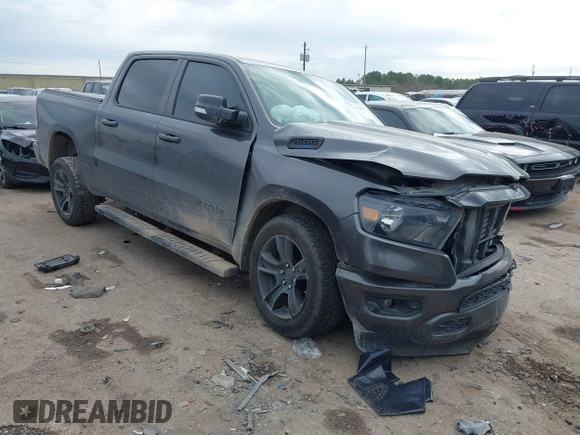 2021 Ram 1500 Lone Star with VIN 1C6RREFT2MN746770, listed as a IAAI auction lot 41360600 with 76,998 mi miles and . Bid and sale history available at DreamBid. Image 1.