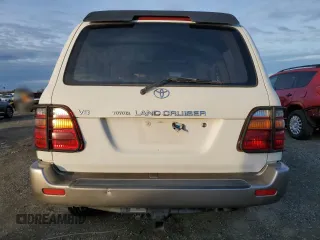 2000 Toyota Land Cruiser z VIN JT3HT05J0Y0122711, wystawiony jako Copart lot #86929954 z przebiegiem Nie podano mil oraz Czysty tytuł • Clean title. Historia ofert i sprzedaży dostępna na DreamBid. Obrazek 6.