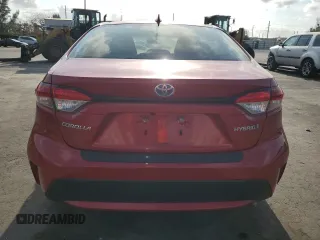 2021 Toyota Corolla Hybrid LE with VIN JTDEAMDE5MJ012662, listed as a Copart auction lot 52142455 with 138,564 mi miles and Clean Title. Bid and sale history available at carsss.com. Image 6.