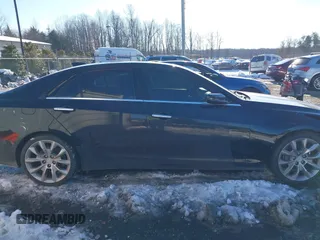 2017 Cadillac CTS Luxury AWD z VIN 1G6AX5SX7H0176310, wystawiony jako IAAI lot #41293373 z przebiegiem 161 264 mil mil oraz . Historia ofert i sprzedaży dostępna na DreamBid. Obrazek 14.