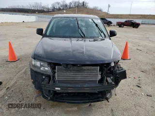 2019 Dodge Journey GT with VIN 3C4PDDEG4KT694925, listed as a Copart auction lot 49669185 with 118,355 mi miles and Salvage title. Bid and sale history available at DreamBid. Image 5.