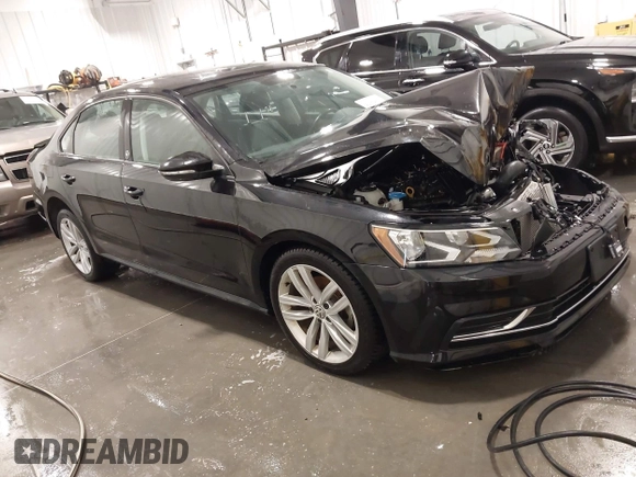 2019 Volkswagen Passat Wolfsburg Edition z VIN 1VWLA7A36KC004077, wystawiony jako IAAI lot #42164379 z przebiegiem 50 498 mil mil oraz . Historia ofert i sprzedaży dostępna na DreamBid. Obrazek 1.