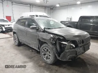 2021 Jeep Cherokee Trailhawk z VIN 1C4PJMBX4MD148597, wystawiony jako IAAI lot #41622099 z przebiegiem 48 452 mil mil oraz . Historia ofert i sprzedaży dostępna na DreamBid. Obrazek 6.