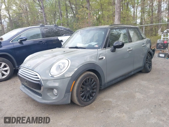 2015 MINI Hardtop 4 Door with VIN WMWXS5C57FT831660, listed as a IAAI auction lot 42057682 with 110,940 mi miles and . Bid and sale history available at DreamBid. Image 2.