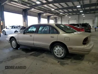 1995 Oldsmobile LSS z VIN 1G3HY5215SH307862, wystawiony jako Copart lot #69297244 z przebiegiem 129 142 mil mil oraz Szkody całkowita. Historia ofert i sprzedaży dostępna na DreamBid. Obrazek 2.