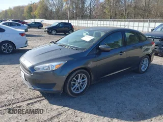 2018 Ford Focus SE with VIN 1FADP3F27JL294865, listed as a IAAI auction lot 41897496 with 100,048 mi miles and . Bid and sale history available at carsss.com. Image 2.