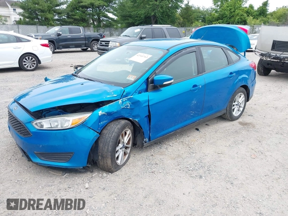2015 Ford Focus SE z VIN 1FADP3F26FL252212, wystawiony jako IAAI lot #42345763 z przebiegiem 102 549 mil mil oraz . Historia ofert i sprzedaży dostępna na DreamBid. Obrazek 2.
