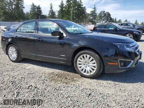 2012 Ford Fusion Hybrid с VIN 3FADP0L38CR181507, выставлен на аукционе Copart как лот 58767785 с пробегом 133 844 миль миль и Списание • Salvage title. История ставок и продаж доступна на DreamBid. Изображение 4.