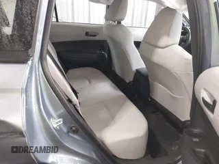 2022 Toyota Corolla Cross L with VIN 7MUAAAAG9NV034659, listed as a IAAI auction lot 42125356 with 14,631 mi miles and . Bid and sale history available at DreamBid. Image 8.