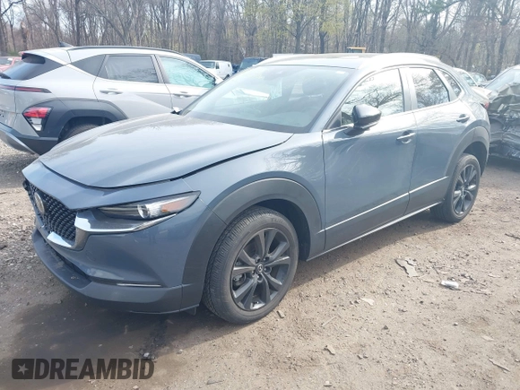 2023 Mazda CX-30 S Carbon Edition with VIN 3MVDMBCM8PM502891, listed as a IAAI auction lot 42050533 with 20,035 mi miles and . Bid and sale history available at DreamBid. Image 17.