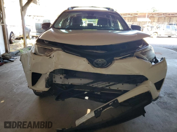 2017 Toyota RAV4 LE with VIN JTMBFREV7HJ148815, listed as a Copart auction lot 82632724 with 24,775 mi miles and Salvage Title. Bid and sale history available at DreamBid. Image 5.