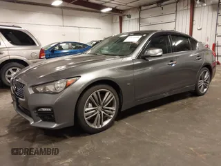 2014 Infiniti Q50 Premium with VIN JN1BV7ARXEM699902, listed as a IAAI auction lot 42135410 with 103,929 mi miles and . Bid and sale history available at DreamBid. Image 18.