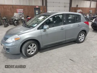2009 Nissan Versa 1.8 SL with VIN 3N1BC13E99L409551, listed as a IAAI auction lot 41628375 with 214,873 mi miles. Bid and sale history available at carsss.com. Image 2.