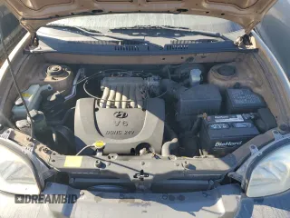 2001 Hyundai Santa Fe GLS with VIN KM8SC83D71U084837, listed as a Copart auction lot 77588984 with 102,585 mi miles and Salvage Title. Bid and sale history available at carsss.com. Image 12.