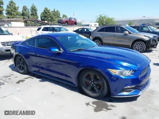 2015 Ford Mustang V6 with VIN 1FA6P8AMXF5325679, listed as a IAAI auction lot 42095960 with 104,888 mi miles. Bid and sale history available at carsss.com. Image 1.