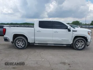 2021 GMC Sierra 1500 SLT z VIN 1GTU9DED9MZ359939, wystawiony jako IAAI lot #42245771 z przebiegiem 65 756 mil mil oraz . Historia ofert i sprzedaży dostępna na DreamBid. Obrazek 13.