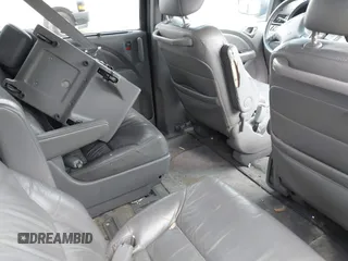 2010 Honda Odyssey EX-L with VIN 5FNRL3H69AB088994, listed as a IAAI auction lot 42007982 with 187,180 mi miles and . Bid and sale history available at DreamBid. Image 8.