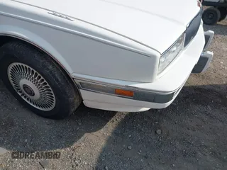 1991 Cadillac Seville z VIN 1G6KS53B9MU820155, wystawiony jako IAAI lot #40035441 z przebiegiem 78 021 mil mil oraz . Historia ofert i sprzedaży dostępna na DreamBid. Obrazek 12.